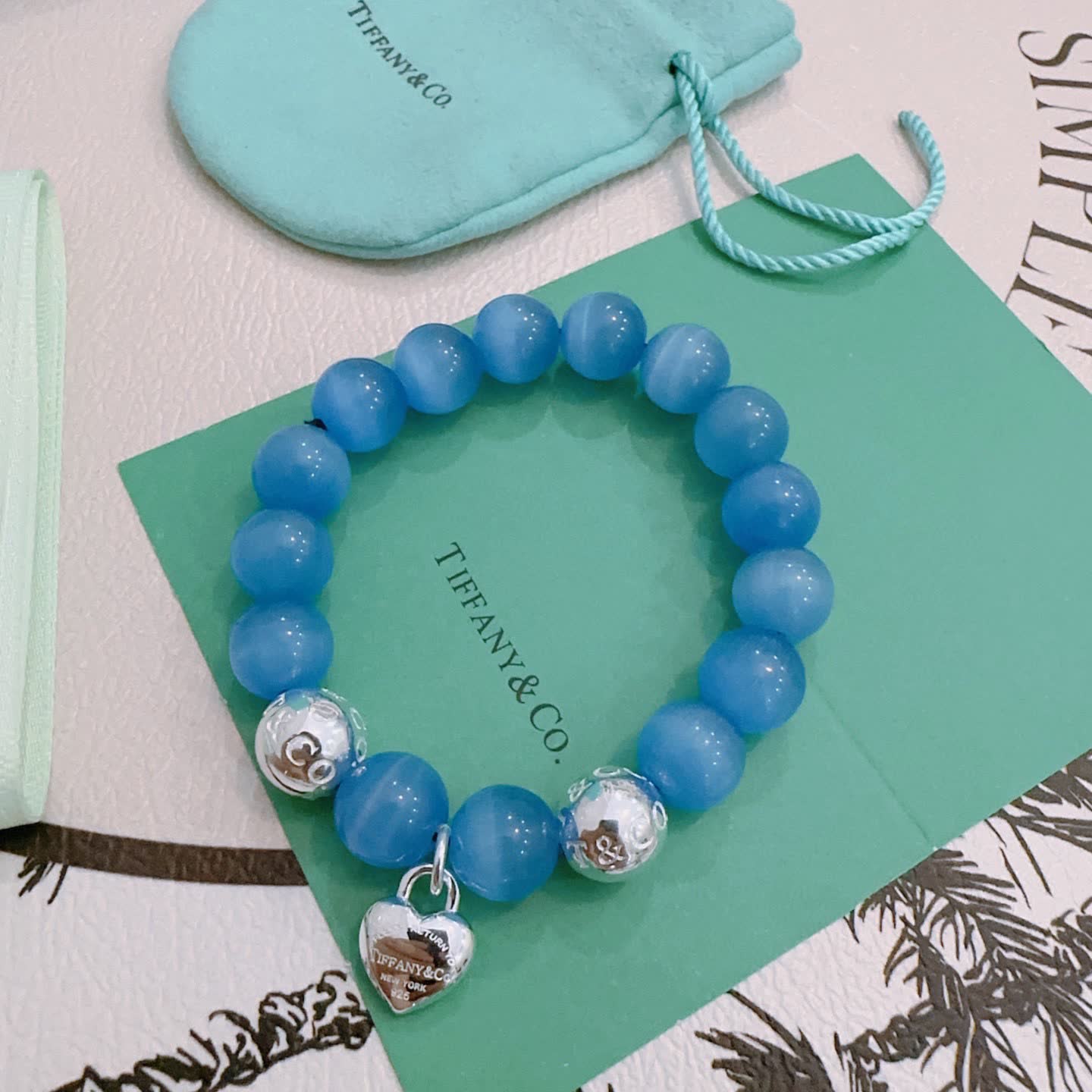 Tiffany & Co. Blue Beaded Bracelet with Lock Charm